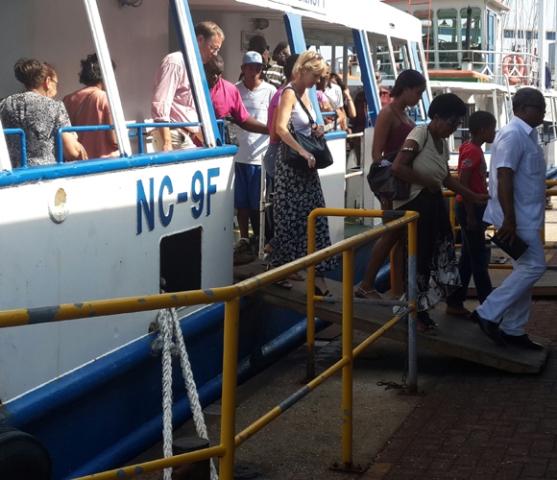 Tourists boarding a boat
